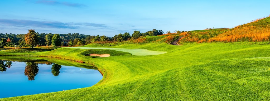 Panoramic view of a lush green golf course at LedgeRock Golf Club. Smooth