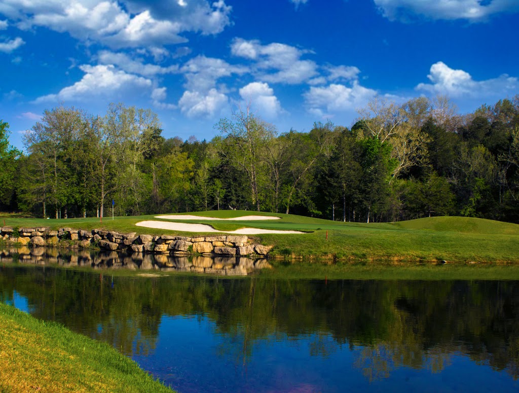 Panoramic view of a lush green golf course at Ledgestone Country Club - Public Welcome. Smooth