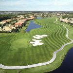 Panoramic view of a lush green golf course at Legacy Golf Club At Lakewood Ranch. Smooth