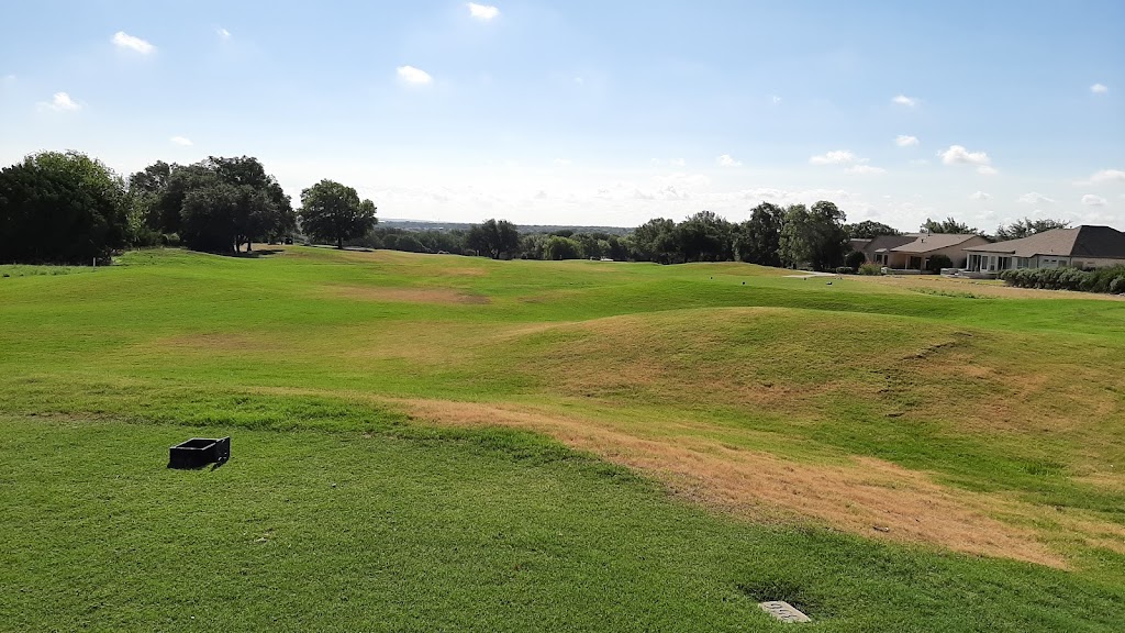 Panoramic view of a lush green golf course at Legacy Hills Golf Club. Smooth
