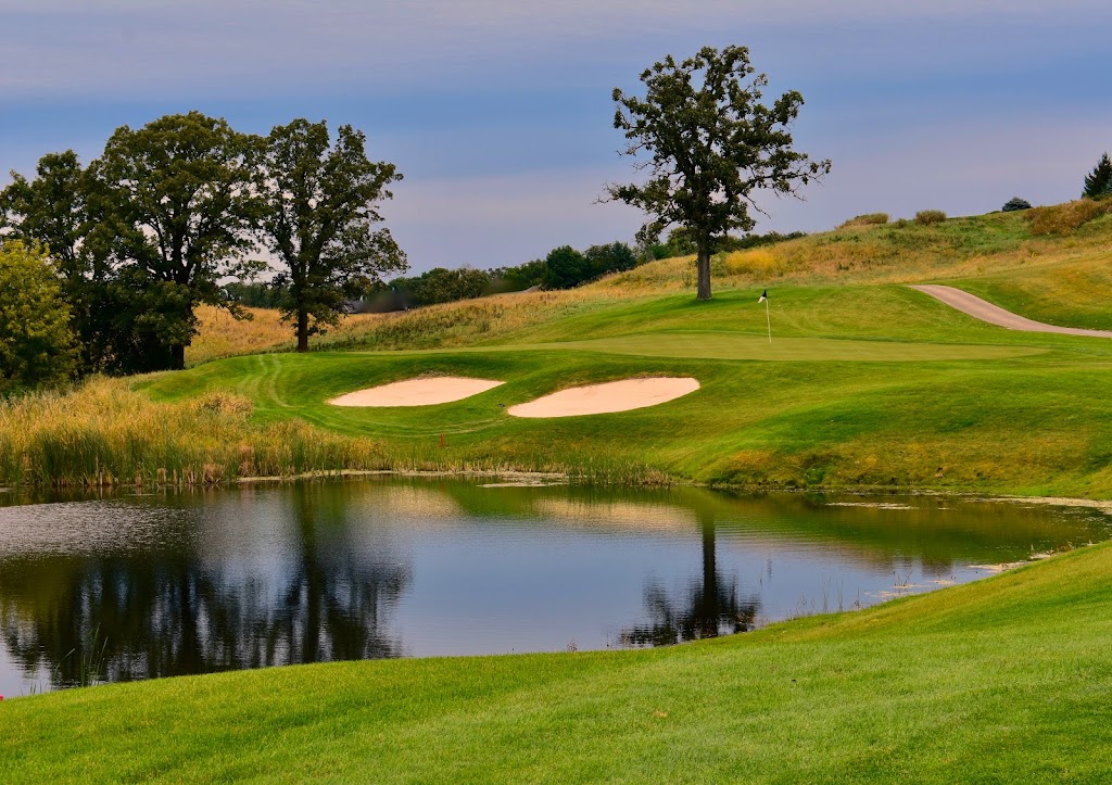 Panoramic view of a lush green golf course at Legends Golf Club. Smooth