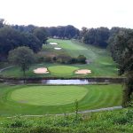Panoramic view of a lush green golf course at Lehigh Country Club. Smooth
