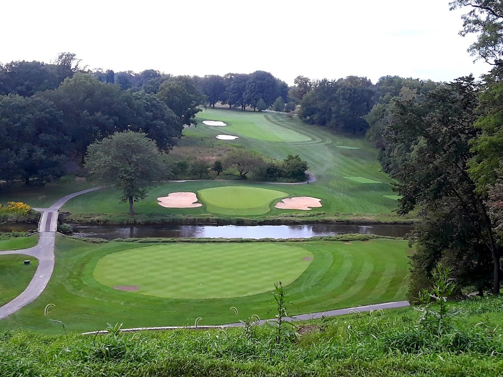 Panoramic view of a lush green golf course at Lehigh Country Club. Smooth