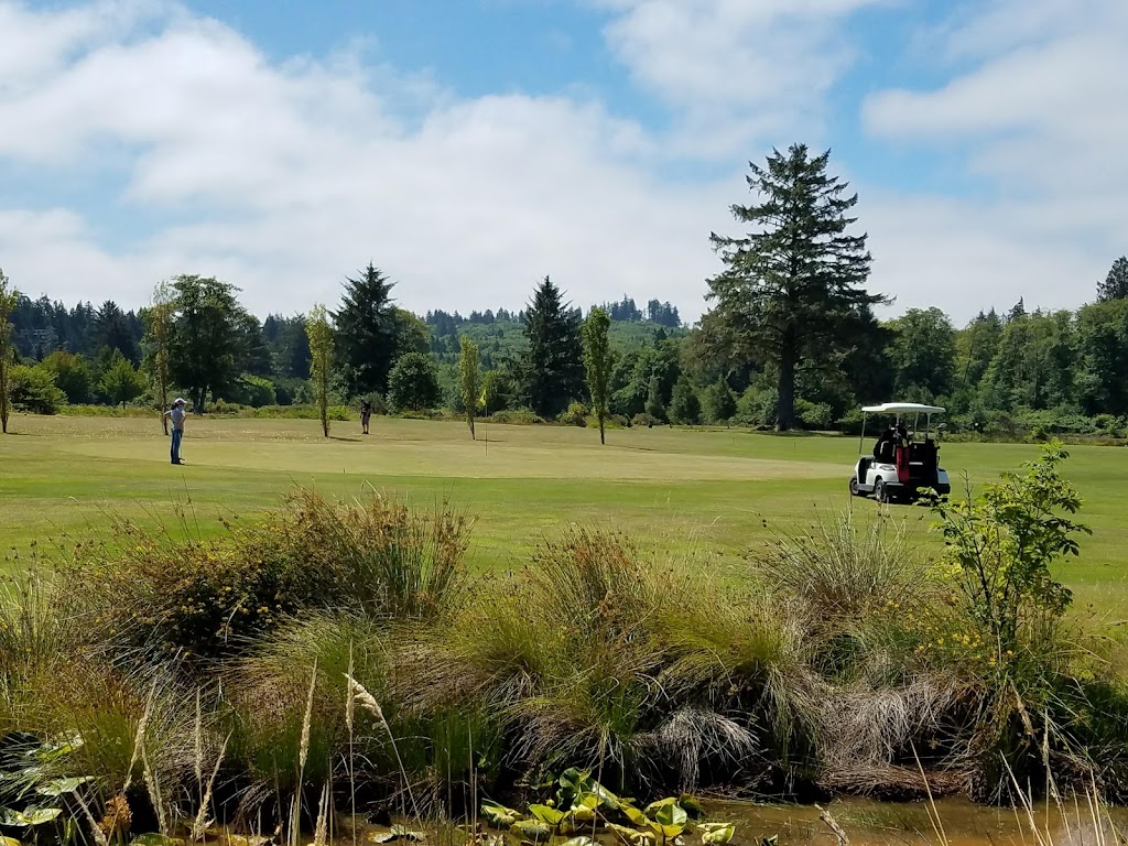 Panoramic view of a lush green golf course at Lewis & Clark Public Golf Course. Smooth