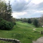 Panoramic view of a lush green golf course at Lewisburg Elks Country Club. Smooth