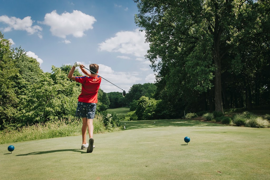 Panoramic view of a lush green golf course at Lick Creek Golf Course. Smooth