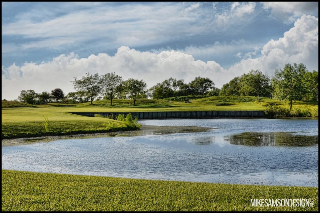 Panoramic view of a lush green golf course at Links At Carillon Golf Course. Smooth