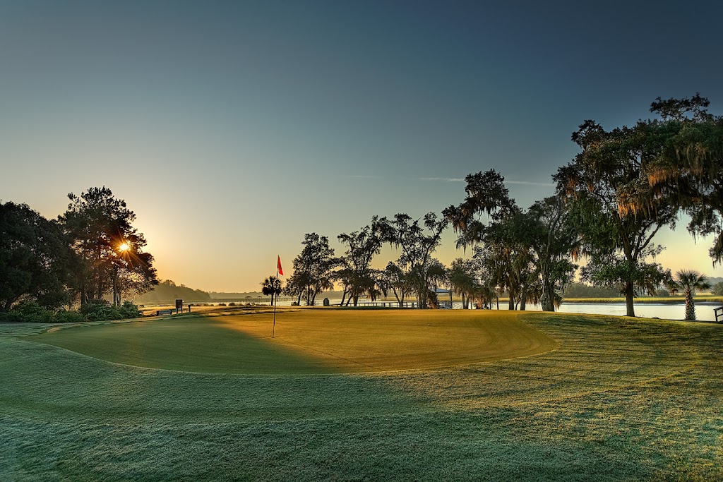 Panoramic view of a lush green golf course at Links At Stono Ferry. Smooth