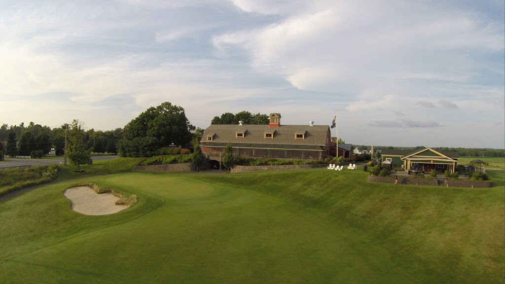 Panoramic view of a lush green golf course at Links at Outlook Golf Course. Smooth