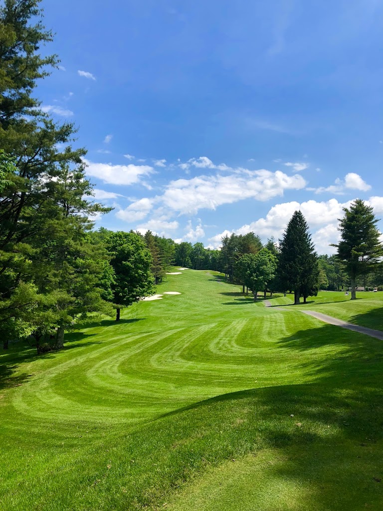 Panoramic view of a lush green golf course at Linville Land Harbor Golf Club. Smooth