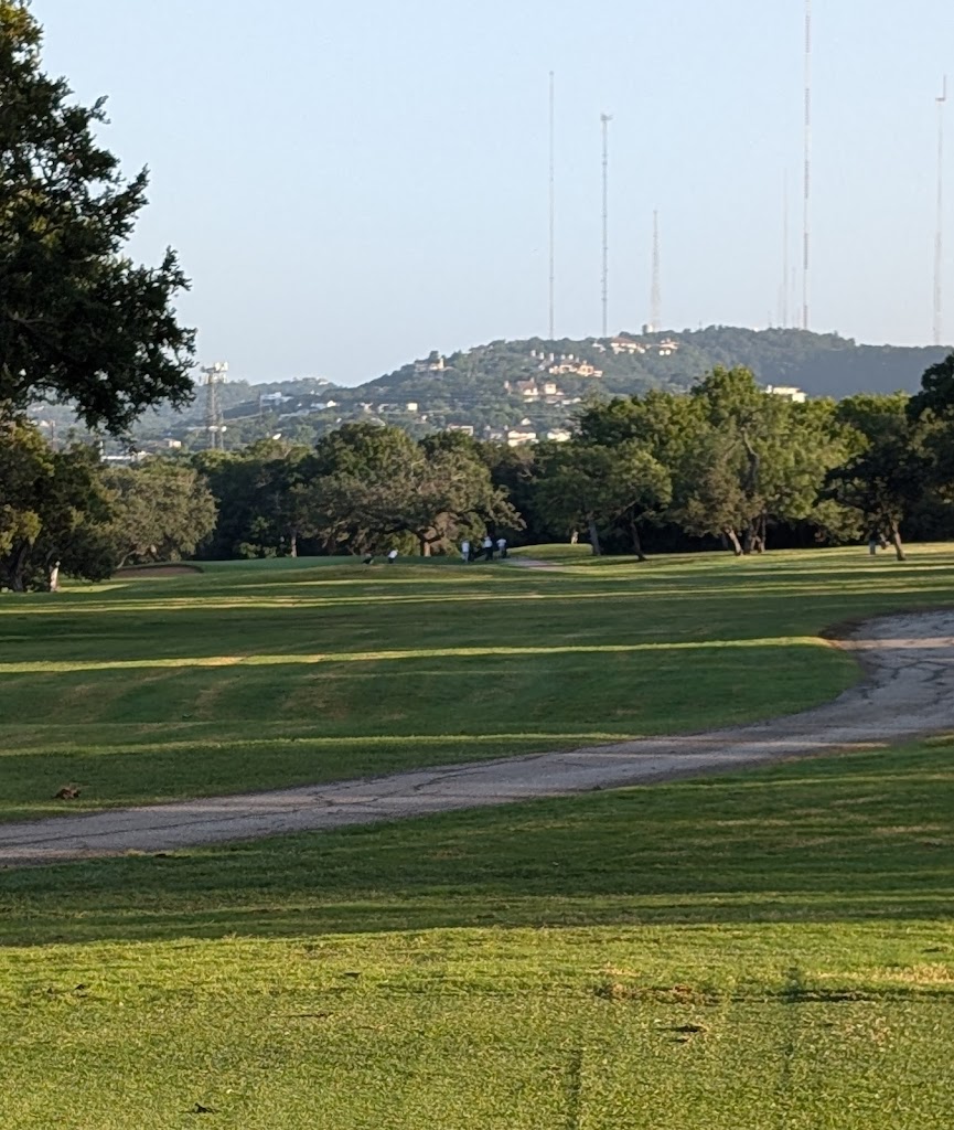 Panoramic view of a lush green golf course at Lions Municipal Golf Course. Smooth