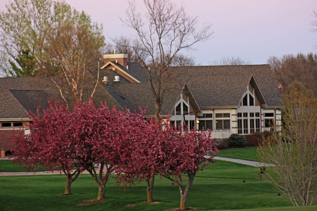 Panoramic view of a lush green golf course at Lochland Country Club. Smooth