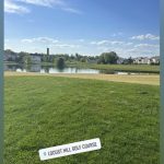 Panoramic view of a lush green golf course at Locust Hill Golf Course