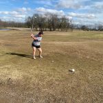 Panoramic view of a lush green golf course at Lone Pine Golf Course. Smooth