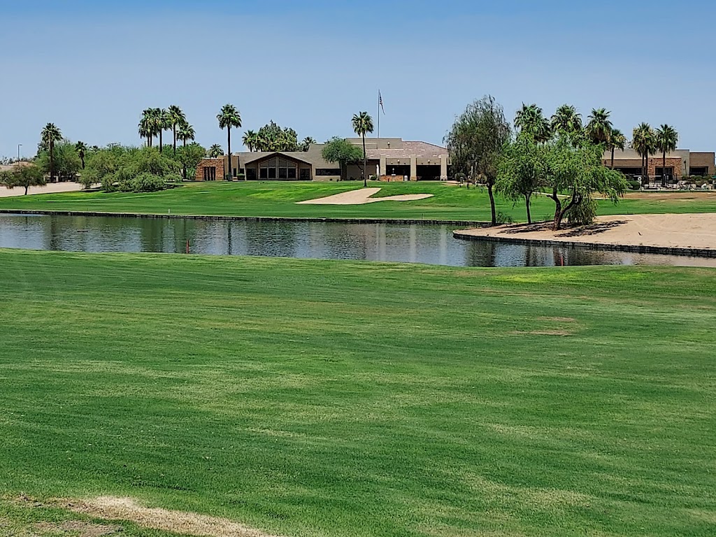 Panoramic view of a lush green golf course at Lone Tree Golf Club. Smooth