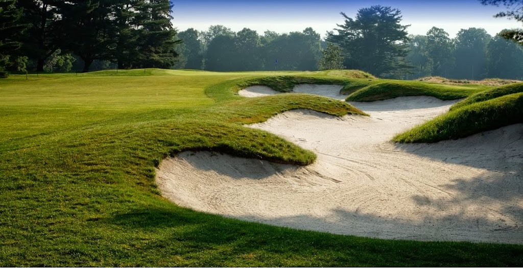 Panoramic view of a lush green golf course at Longshore Golf Course. Smooth