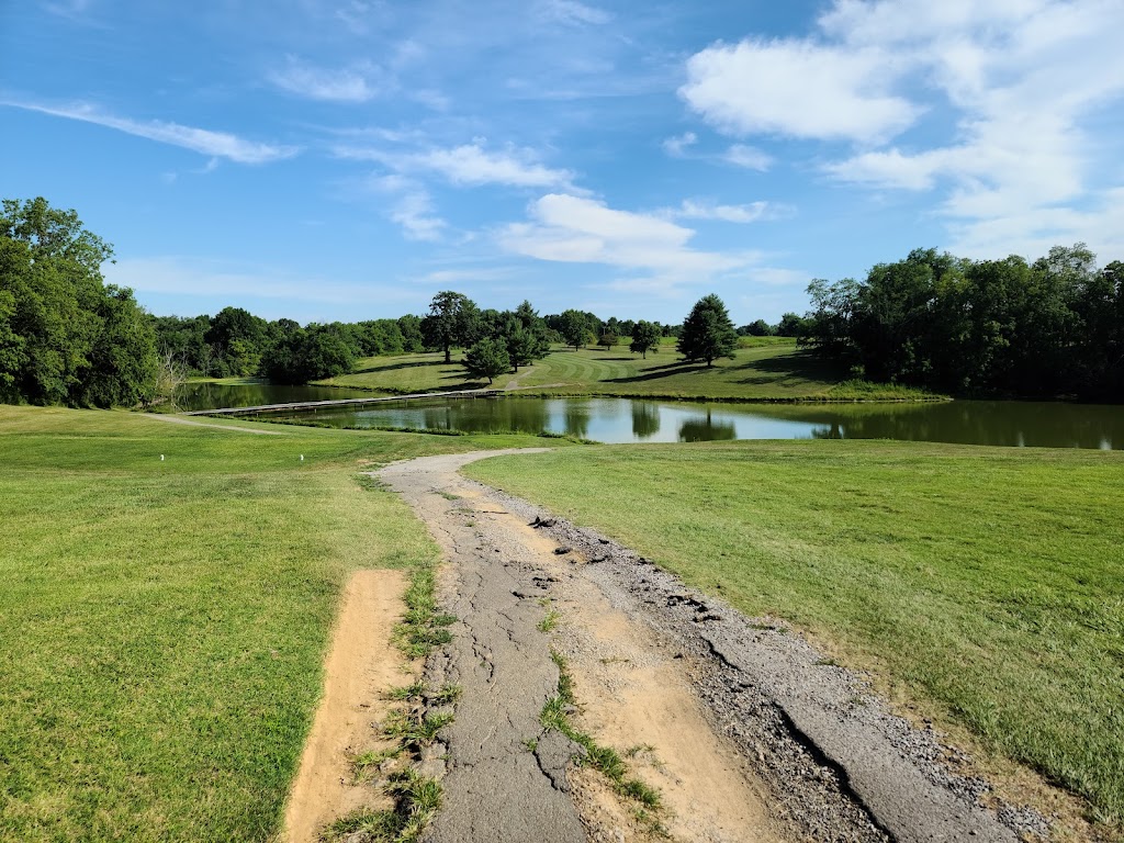Panoramic view of a lush green golf course at Longview Golf Course. Smooth