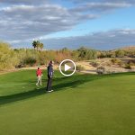 green grass with the flag in the hole.