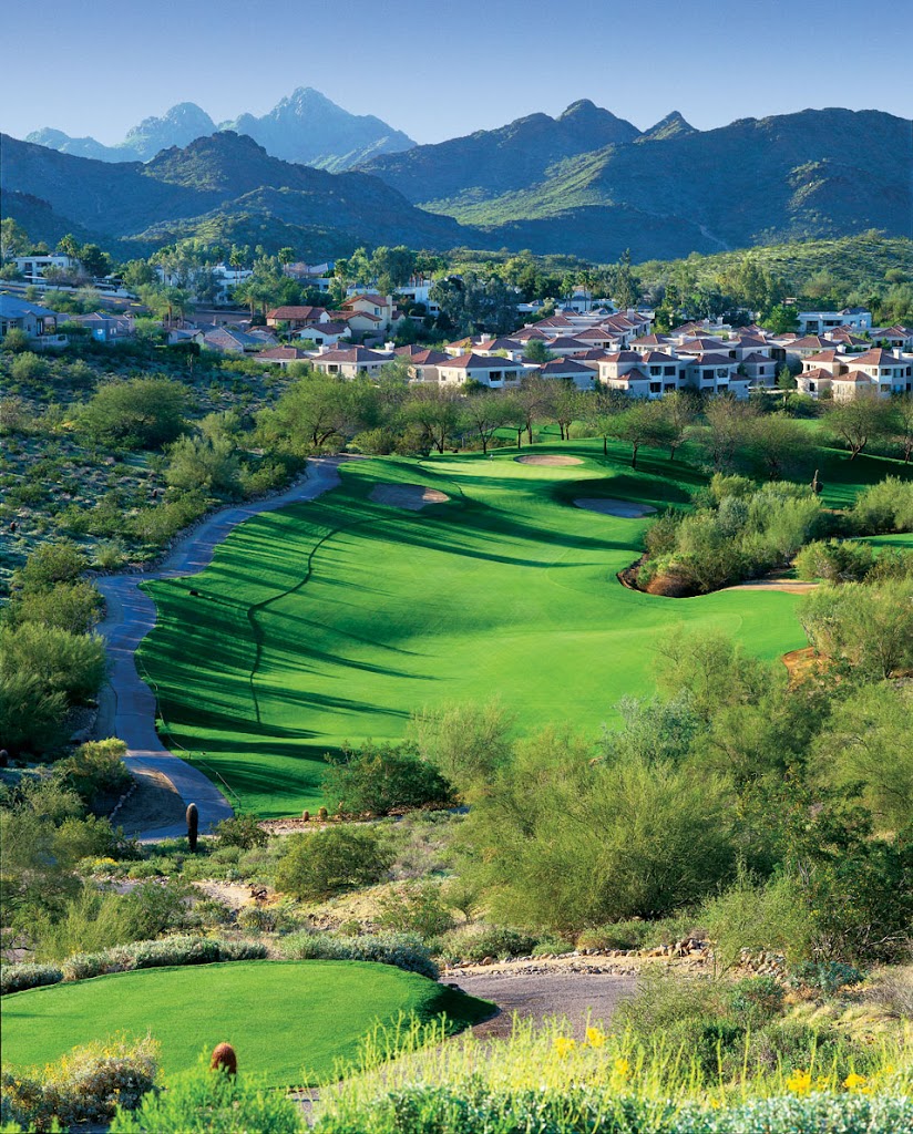 Panoramic view of a lush green golf course at Lookout Mountain Golf Club. Smooth