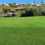 Panoramic view of a lush green golf course at Lookout Mountain Golf Course. Smooth