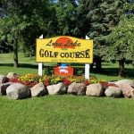 Panoramic view of a lush green golf course at Loon Lake Golf Course. Smooth