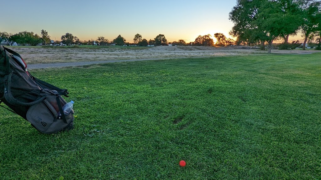 Panoramic view of a lush green golf course at Los Altos Golf Course and Banquet Facility. Smooth