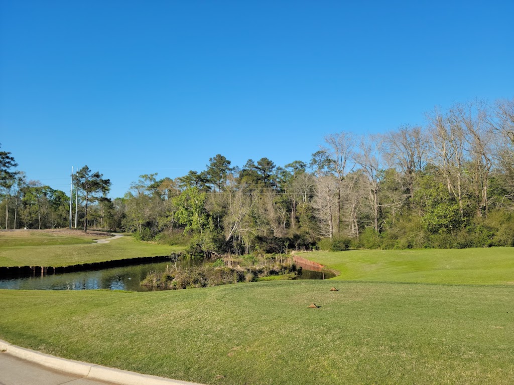 Panoramic view of a lush green golf course at Magnolia Grove Golf Course. Smooth