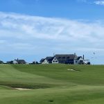 Panoramic view of a lush green golf course at Maidstone Club. Smooth