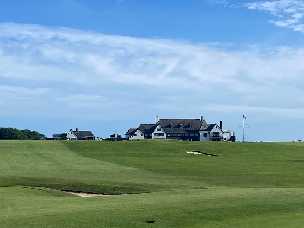 Panoramic view of a lush green golf course at Maidstone Club. Smooth