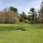 Panoramic view of a lush green golf course at Marion Golf Club. Smooth