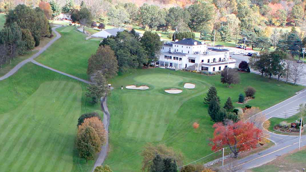 Panoramic view of a lush green golf course at Marlborough Country Club. Smooth