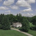 Panoramic view of a lush green golf course at Martinsville Golf Club. Smooth