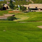 green grass with the flag in the hole.