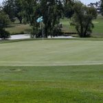 Panoramic view of a lush green golf course at Marysville Golf Club. Smooth