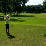 Panoramic view of a lush green golf course at Maumelle Country Club. Smooth