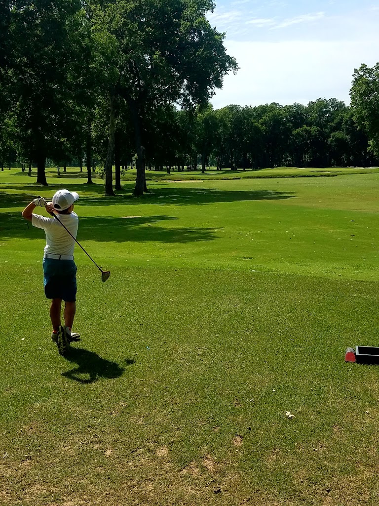 Panoramic view of a lush green golf course at Maumelle Country Club. Smooth