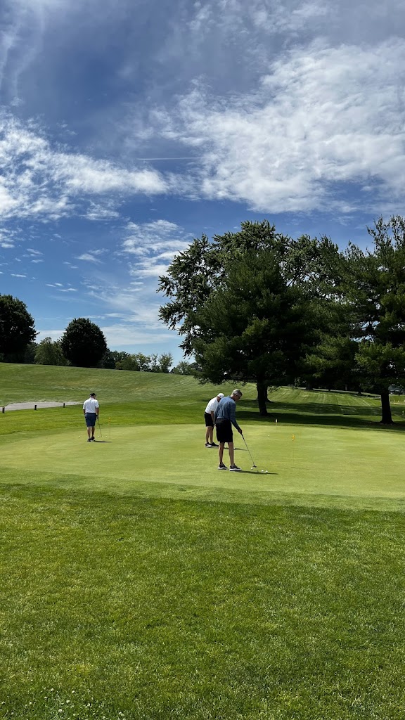 Panoramic view of a lush green golf course at Maxwelton Golf Club. Smooth