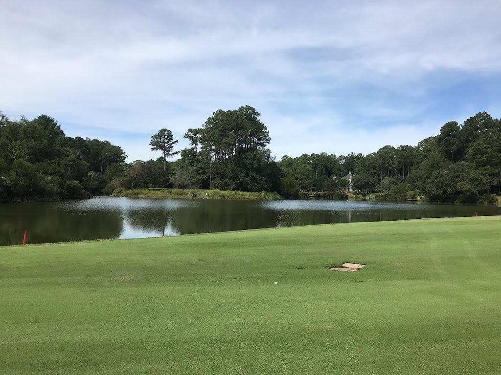 Panoramic view of a lush green golf course at May River Golf Club. Smooth