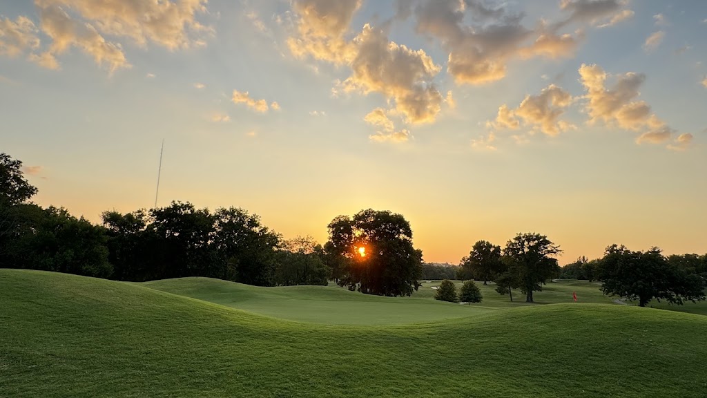 Panoramic view of a lush green golf course at McCabe Golf Course. Smooth