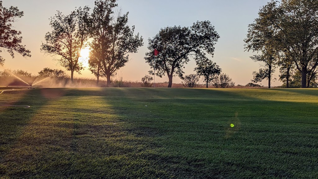 Panoramic view of a lush green golf course at McCook Country Club. Smooth