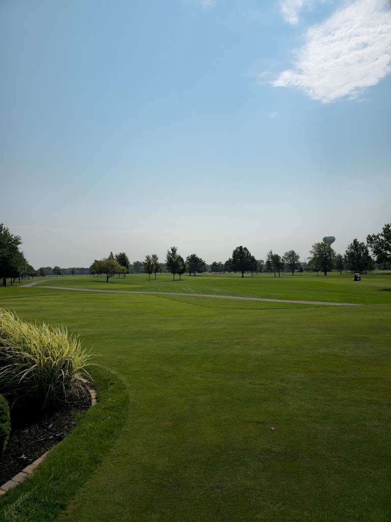 Panoramic view of a lush green golf course at McCormick Creek Golf Course. Smooth