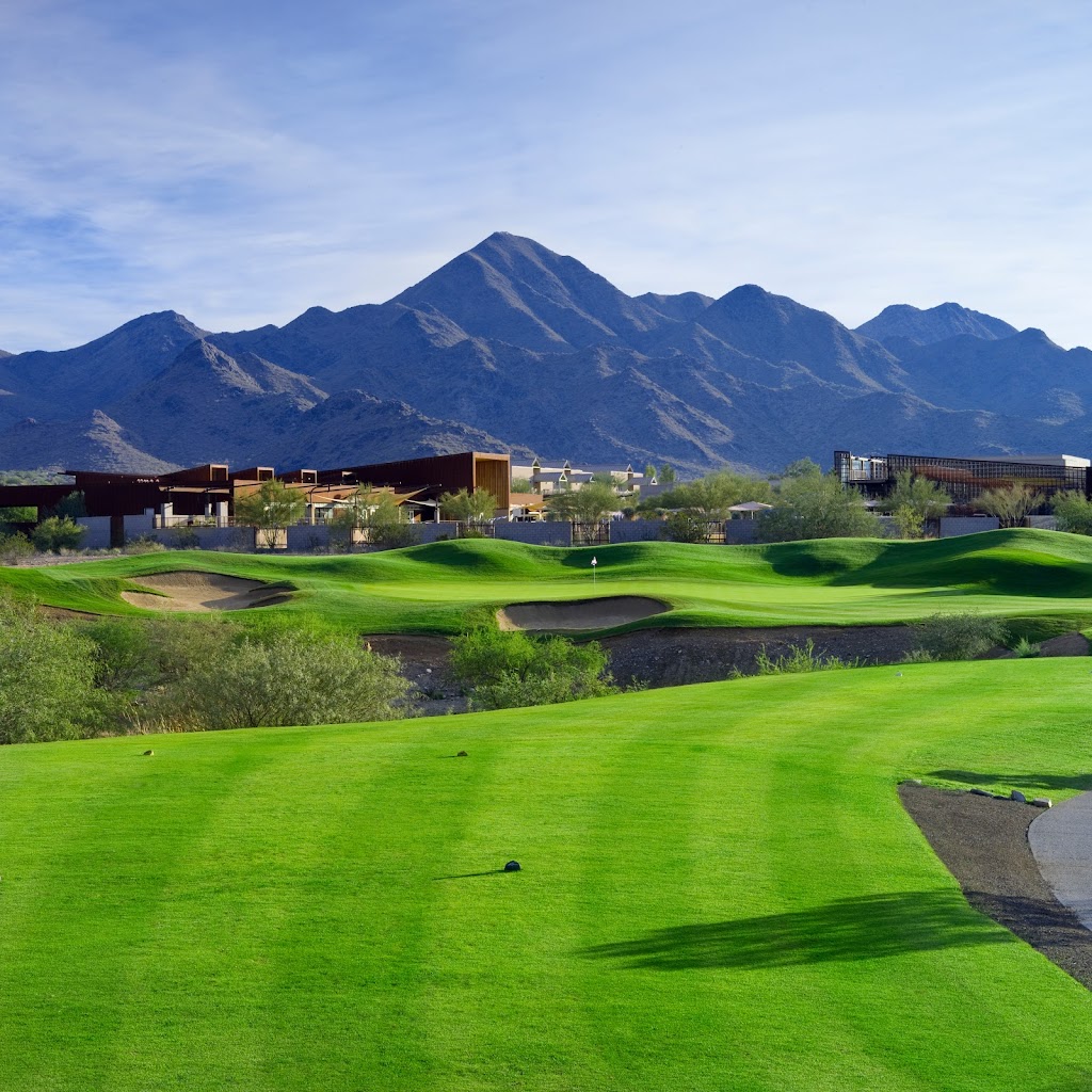 Panoramic view of a lush green golf course at McDowell Mountain Golf Club. Smooth