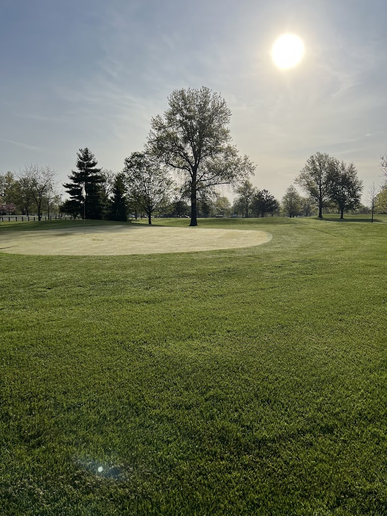 Panoramic view of a lush green golf course at McMillen Golf Course. Smooth