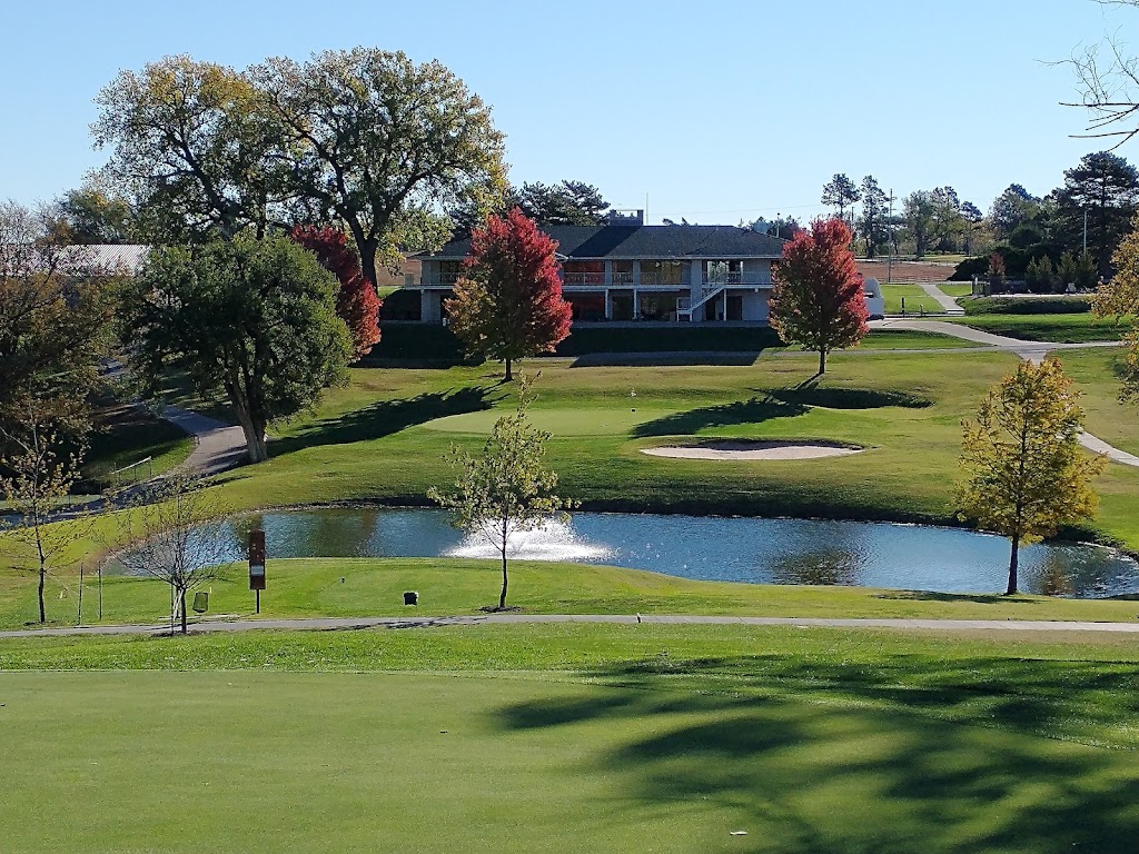 Panoramic view of a lush green golf course at McPherson Country Club. Smooth