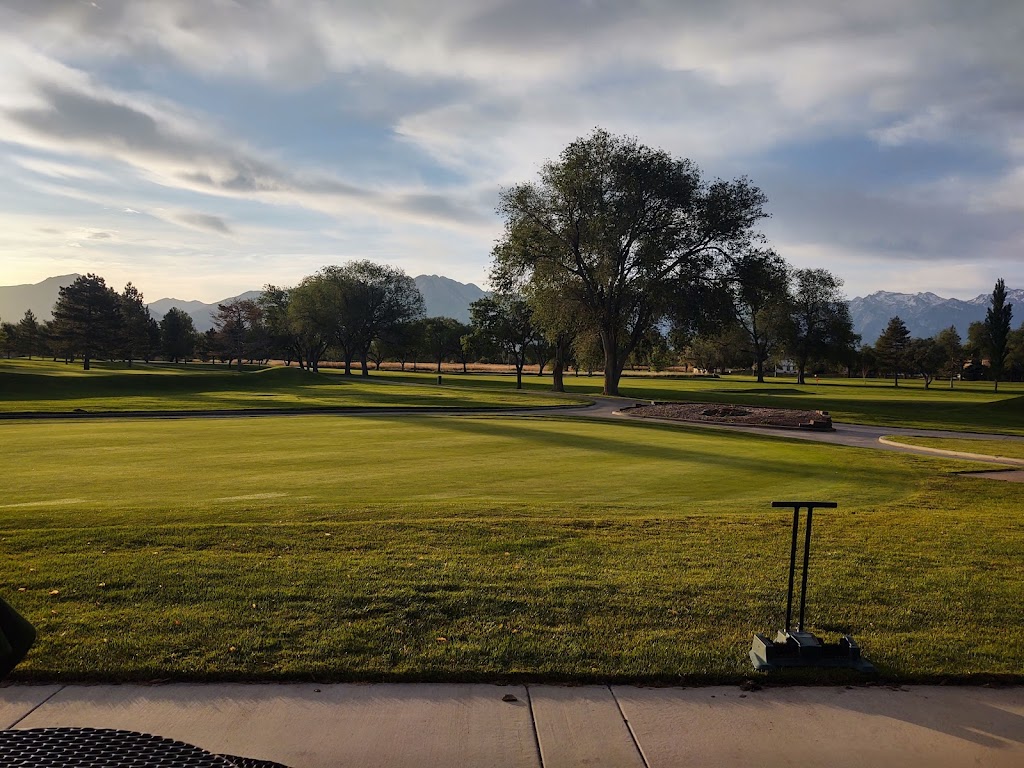 Panoramic view of a lush green golf course at Meadow Brook Golf Course. Smooth