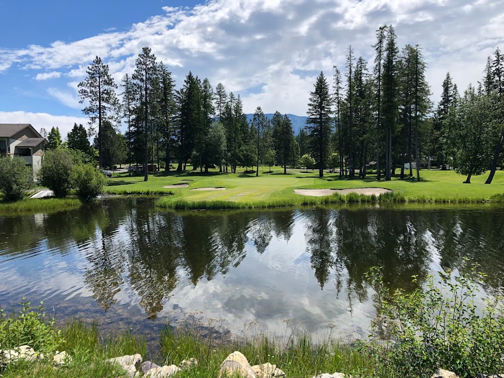 Panoramic view of a lush green golf course at Meadow Lake Golf Course. Smooth