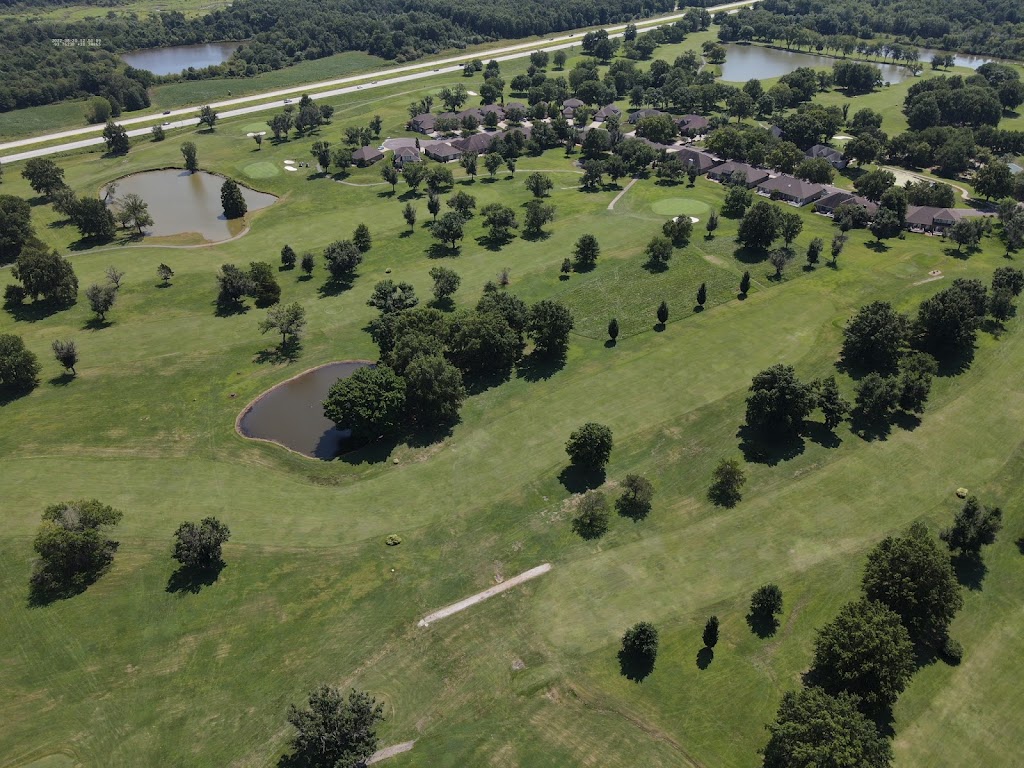 Panoramic view of a lush green golf course at Meadow Lake Golf Course. Smooth