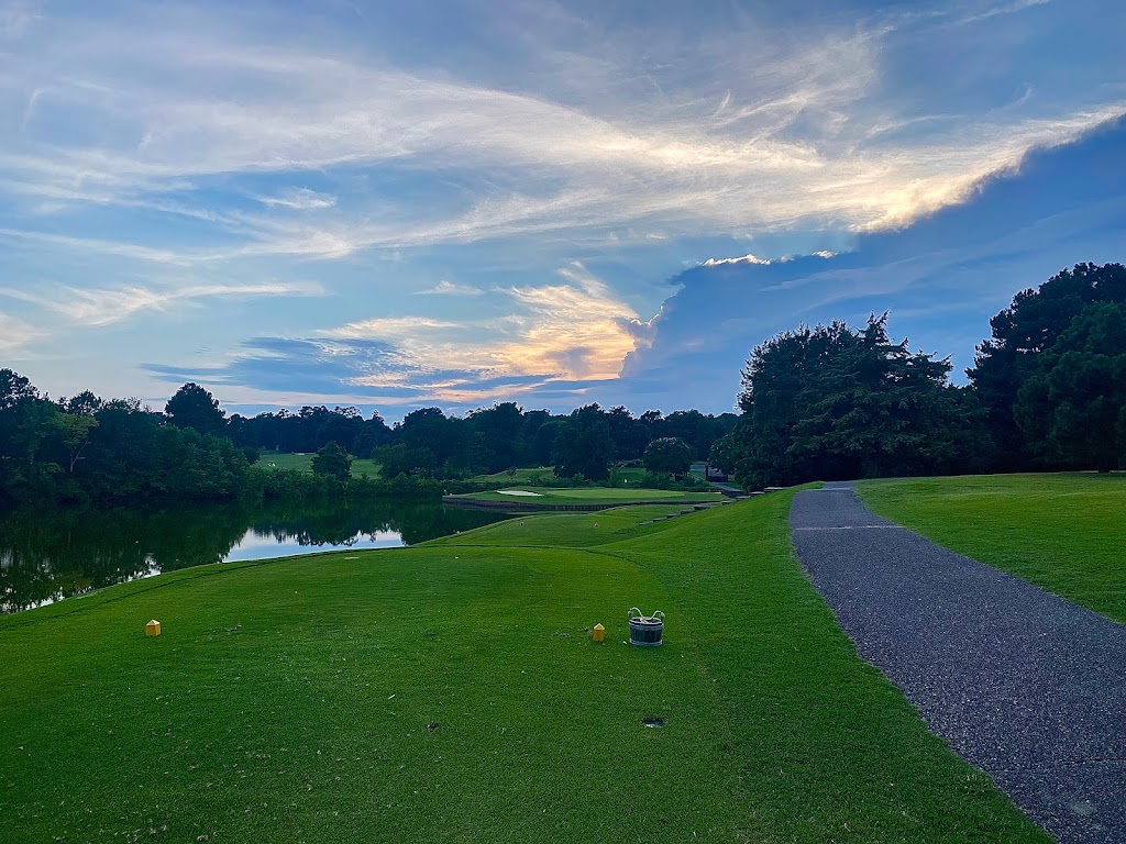Panoramic view of a lush green golf course at Meadowbrook Country Club. Smooth