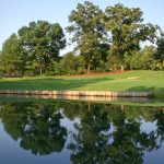 Panoramic view of a lush green golf course at Meadowbrook Golf Club. Smooth