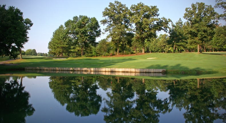 Panoramic view of a lush green golf course at Meadowbrook Golf Club. Smooth